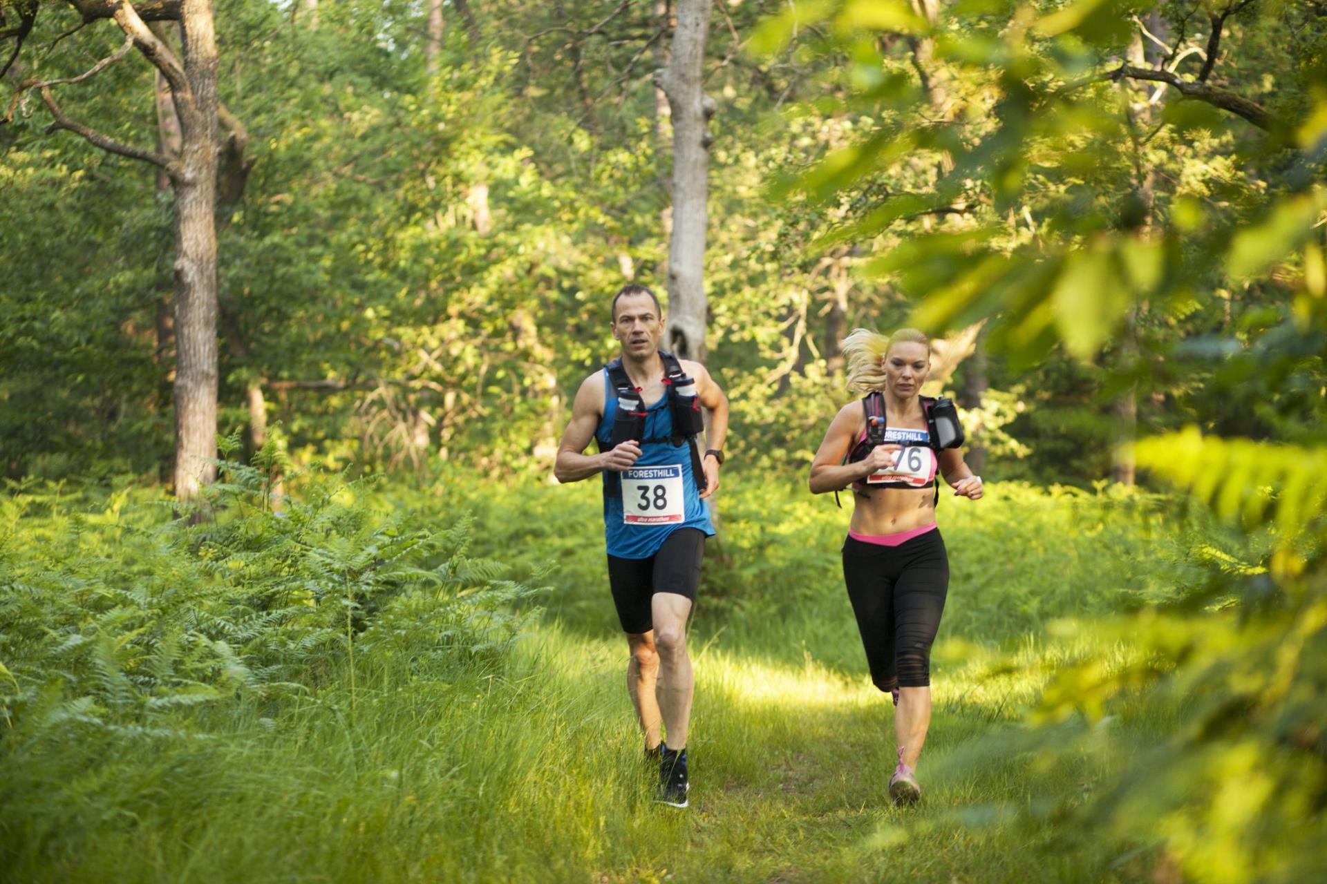 man-and-woman-in-ultramarathon-race-royalty-free-image-1602079209